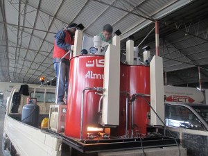 Fondoir de peinture thermoplastique à double cylindres hydrauliques