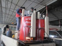 Fondoir de peinture thermoplastique à double cylindres hydrauliques