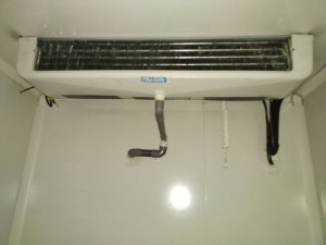 Evaporateur et porte de chambre froide