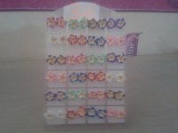 Boucle d'oreille fleur de tiare