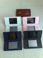 Vend Nitendo DS lite + jeux + coque complete