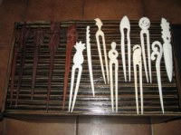 PINCE CHEVEUX BOIS OU OS