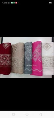 Parure de lits brodés