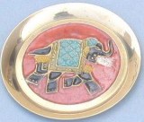 Dessous de plat en métal le travail des éléphants