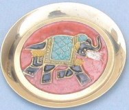 Dessous de plat en métal le travail des éléphants