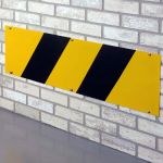 Plaque de protection murale