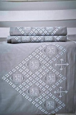 Parure de lits brodés