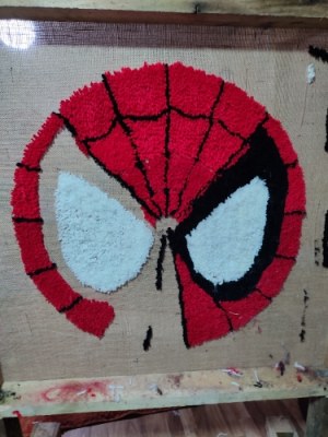 Fabricant de tapis tuftés