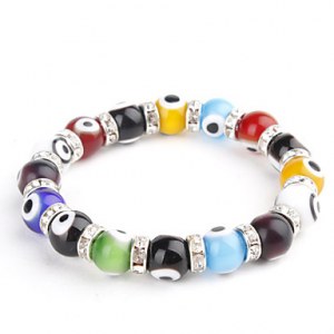 Bracelet bijoux fantaisie compose de billes et d'anneaux en crystaux