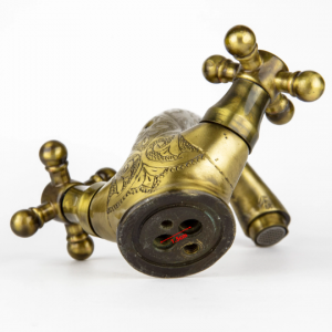 Unlacquered brass faucet