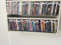 Lot de 620 DVD en boite + 499 DVD location sans boitié d'origine+machine de location en...