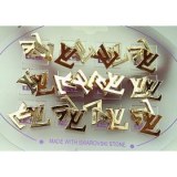 Lot de 36 paires de boucles d'oreilles dorée