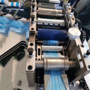 Unité de fabrication de masques de protection