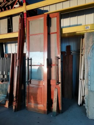 Porte ancienne en chêne et laiton