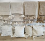 Lot de plaids et housses de coussin à pompons
