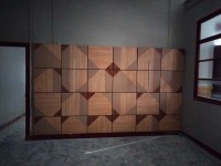 Panneau de parement en bois avec dalles stratifiées DNA