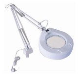Lampe loupe en métal blanc.