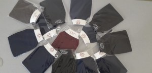 Le gant de gommage Kessa 100% viscose avec logo